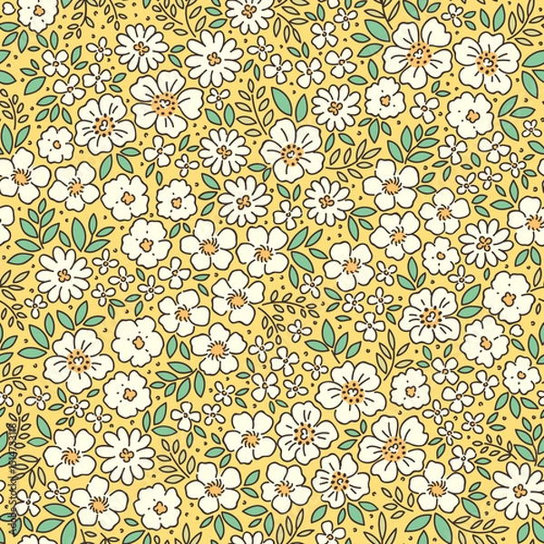 Obraz Retro floral pattern in small decorative flowers. Small white flowers. Green leaves. Light yellow background. Ditsy print. Floral seamless background ditsy pattern in small cute spring flowers.