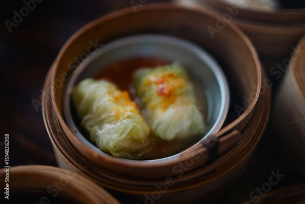 Fototapeta Steamed Cabbage Roll Dim Sum in Bamboo Basket