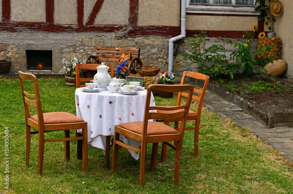 Obraz Kaffee trinken im Bauerngarten