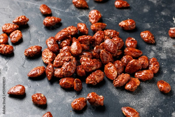 Fototapeta Caramelized almonds. Toasted almonds coated with caramel syrup.