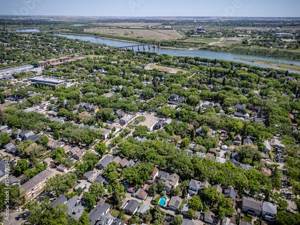 Fototapeta City view with a river running through it