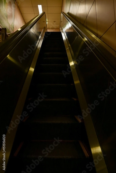 Fototapeta Close-up of the escalator. escalator convergence line. Indoor view.