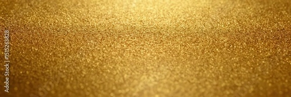 Fototapeta A shimmering gold surface with a textured finish radiates warm light, creating a luxurious, sparkling effect that exudes elegance and rich visual depth. 