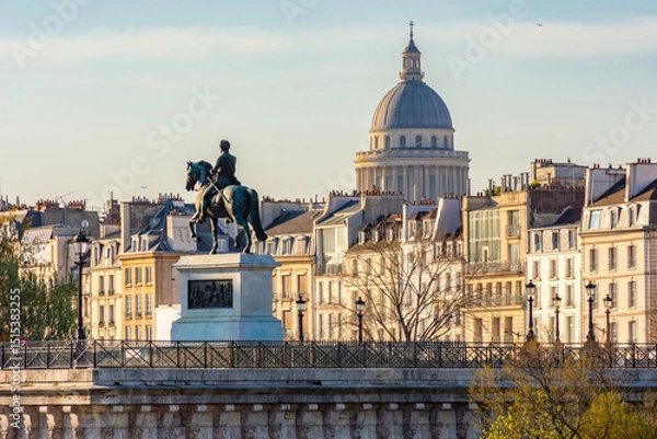 Fototapeta Statue of Henry IV on Cite island and Pantheon dome in Paris, France