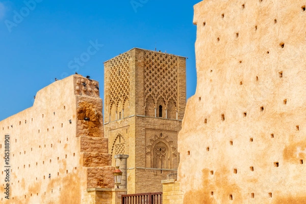 Fototapeta Hassan Tower ancient incomplete mosque minaret and surrounding walls, Rabat, Morocco
