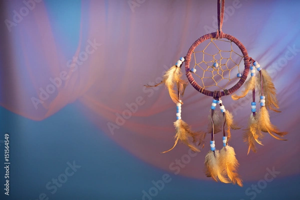 Fototapeta dreamcatcher on a color background
