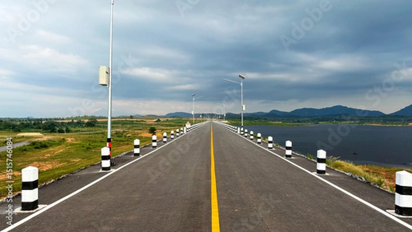 Fototapeta Scenic View of Klong Sung Dam in Nakhon Si Thammarat, Thailand – Tranquil Reservoir and Mountain Landscape