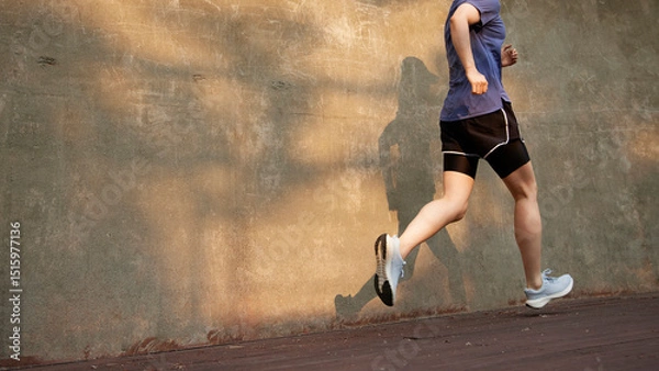 Fototapeta Outdoor Running Routine on a Sunny Day. Running
Motivation. Start Your Fitness Journey.