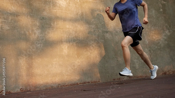 Fototapeta Outdoor Running Routine on a Sunny Day. Running
Motivation. Start Your Fitness Journey.