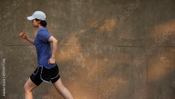 Fototapeta Outdoor Running Routine on a Sunny Day. Running
Motivation. Start Your Fitness Journey.