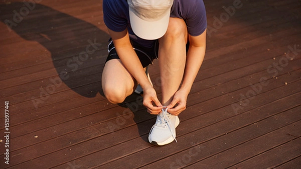 Fototapeta Outdoor Running Routine on a Sunny Day. Running
Motivation. Start Your Fitness Journey.