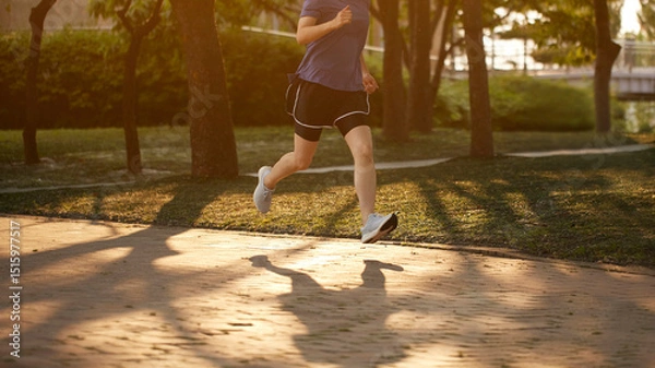 Fototapeta Outdoor Running Routine on a Sunny Day. Running
Motivation. Start Your Fitness Journey.