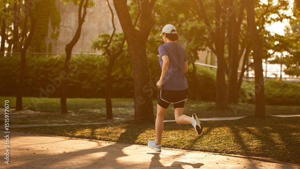 Fototapeta Outdoor Running Routine on a Sunny Day. Running
Motivation. Start Your Fitness Journey.