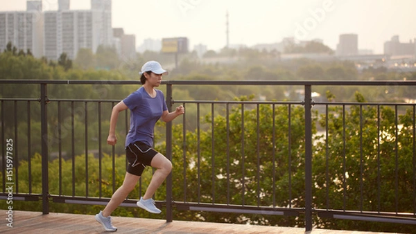 Fototapeta Outdoor Running Routine on a Sunny Day. Running
Motivation. Start Your Fitness Journey.