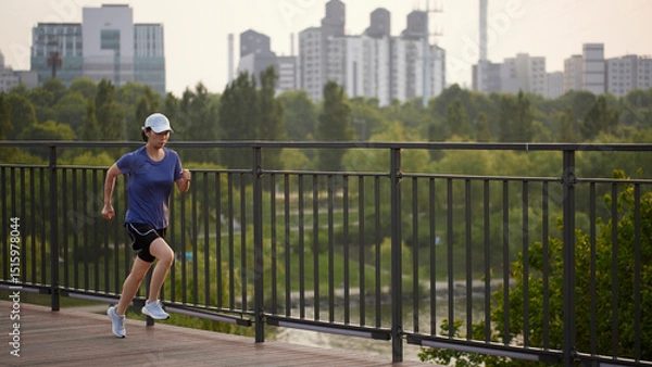 Fototapeta Outdoor Running Routine on a Sunny Day. Running
Motivation. Start Your Fitness Journey.