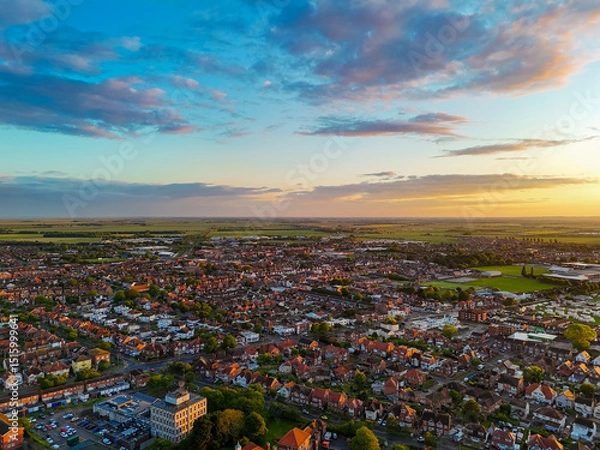 Obraz Sunset Aerial Panoramic View of the UK Seaside Skegness, a busy tourist town with something for everyone, from stunning campsites to a sunset to die for, showcases the beauty serene sunset. June 2025