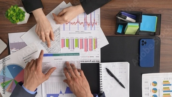 Fototapeta Collaborative Business Meeting Analyzing Financial Growth Charts