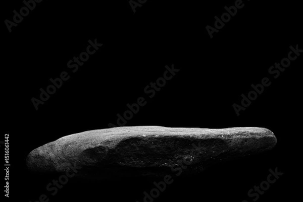 Obraz Stone podium on dark black background..
