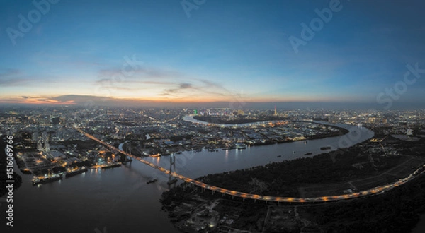 Fototapeta Stunning view of Phu My bridge illuminated at dusk overlooking Ho Chi Minh City, Vietnam