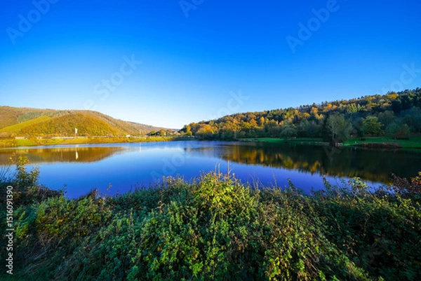 Obraz View of the Eiserbachsee lake in Rurberg near Simmerath. Landscape at the Eiserbach dam. Nature in the Eifel region.
