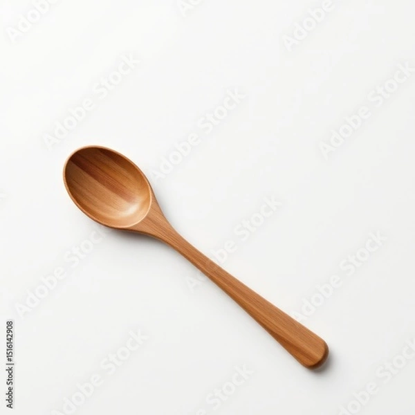 Fototapeta single wooden spoon on a white background, in a refined style, with sharp details, minimal reflection, studio glow, high resolution