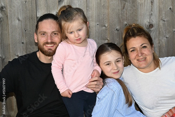 Fototapeta happy and smiling family close-up