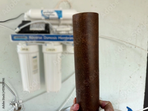 Fototapeta The water filter is very dirty, Change the water filter