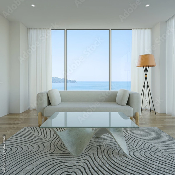 Fototapeta Sofa on wooden floor of living room in modern house. Minimal home interior 3d rendering with sea view.