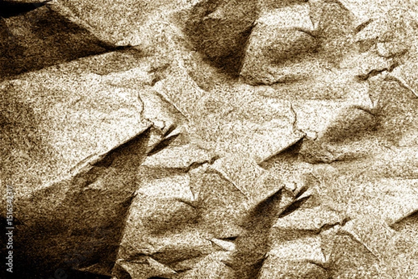 Fototapeta Crumpled paper creates textured background with light brown hues