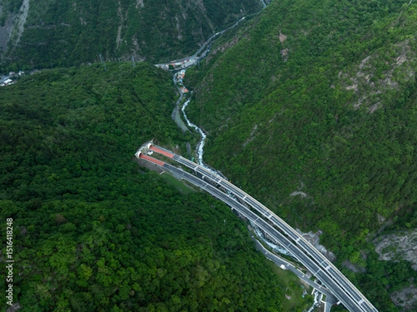 Fototapeta Aerial view of  beautiful forest mountain and highway landscape