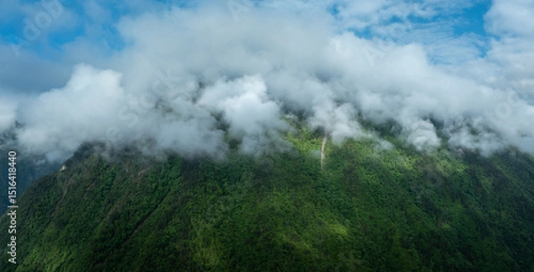 Fototapeta Aerial view of  beautiful foggy forest mountain landscape