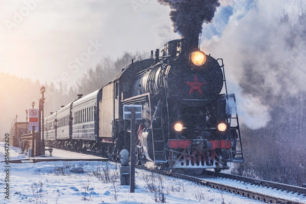 Obraz Retro train departs from the platform.
