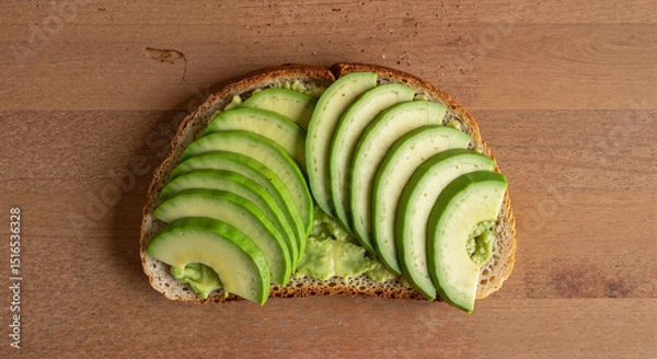 Fototapeta Avocado toast with green apple slices on whole grain bread