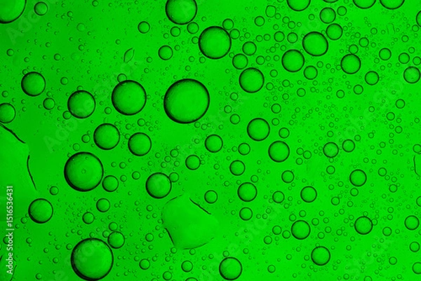 Fototapeta Close-up macro bubbles of green drink,Closeup of bubbly green soda with refreshing carbonation