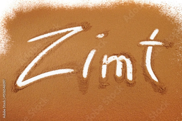 Obraz Zimt Text auf weißem Hintergrund gestreut