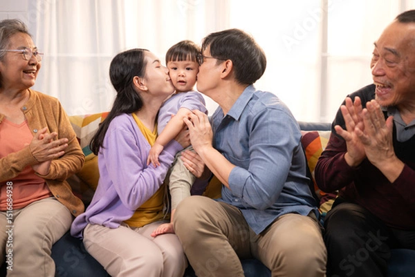 Fototapeta Happy multi-generational Asian family enjoying quality time together at home