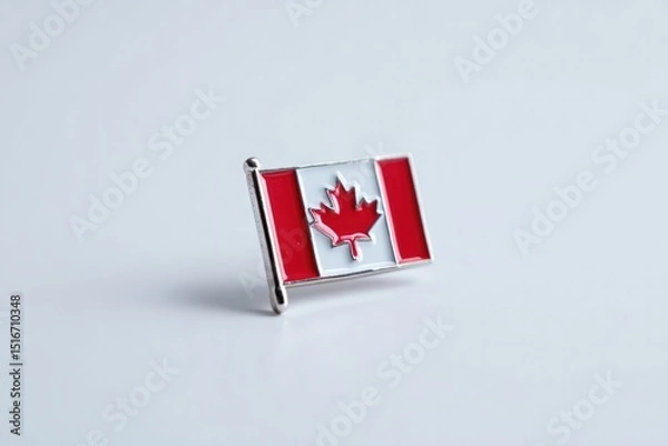 Fototapeta minimalistic image of small canadian flag lapel pin with simple white background and ample copy space evokes clean