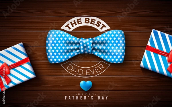 Fototapeta Happy Father's Day Greeting Card Design with Gift Box, Blue Heart, Blue Dotted Bow Tie and Typography Lettering on Vintage Wood Background. Vector Celebration Illustration for Loved and Best Dad