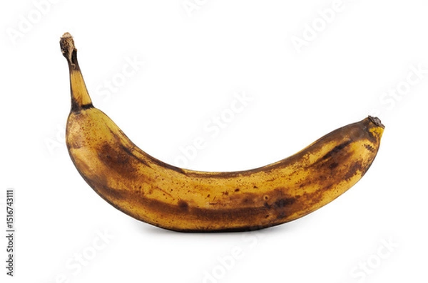 Fototapeta Overripe banana with blackened peel isolated on white background.