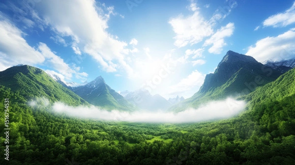 Obraz Breathtaking cinematic panorama of lush green valley surrounded by fog drenched mountains under vibrant sunrise, with serene and peaceful atmosphere