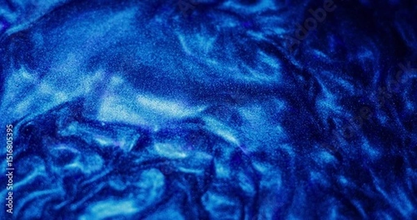 Fototapeta Abstract background. The blue paint with sparkles is bubbling and shimmering
