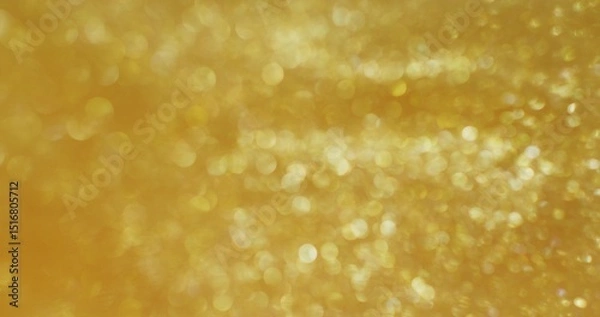 Obraz Abstract background. The golden sequins are bubbling and shimmering. Blurred boho sequins