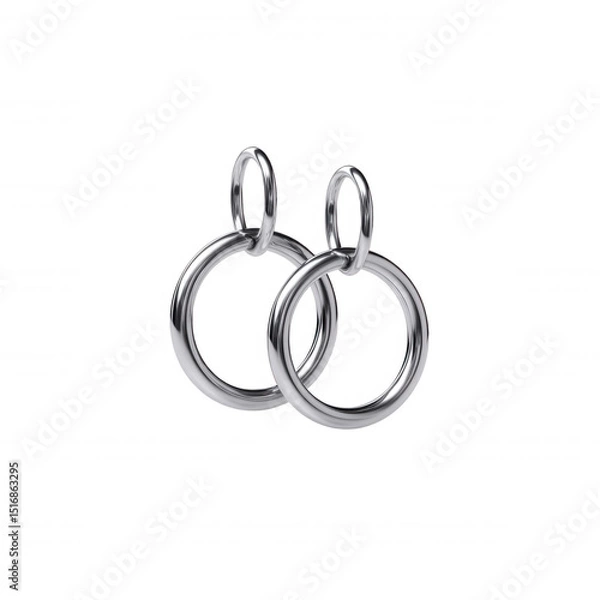 Obraz Two shining silver hoop ears dangle elegantly against a clean white background, showcasing their minimalist design and reflecting light beautifully for jewelry photography.