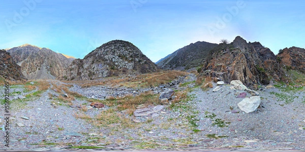 Obraz Full Spherical panorama of dry rocky riverbed in mountain ravine in equirectangular projection