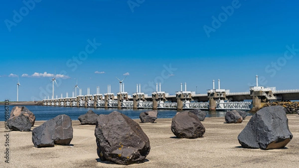 Obraz Granite blocks in front of the Oosterschelde storm surge barrier (Osterscheldekering) in Vrouwenpolder, province of Zeeland, The Netherlands