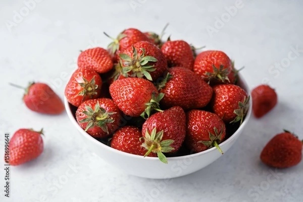 Obraz Fresh red strawberries in a white bowl