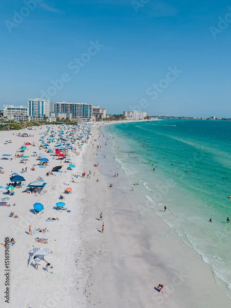 Fototapeta Beautiful aerial view of Sarasota, the magnificent white sand beach, and its iconic St. Armands Circle