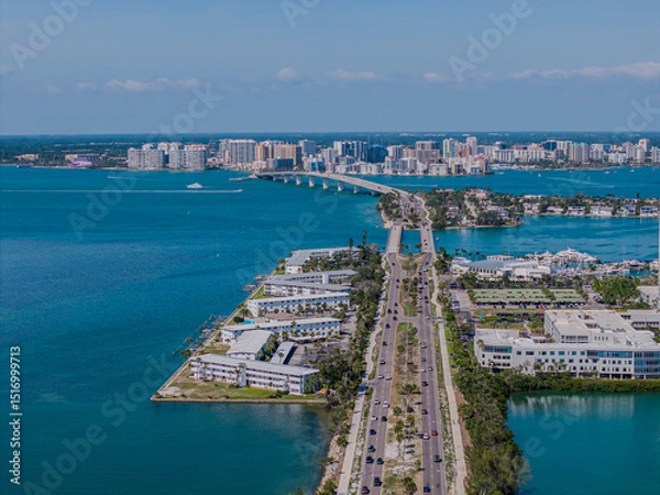 Fototapeta Beautiful aerial view of Sarasota, the magnificent white sand beach, and its iconic St. Armands Circle