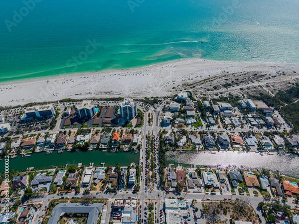 Fototapeta Beautiful aerial view of Sarasota, the magnificent white sand beach, and its iconic St. Armands Circle