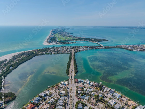 Fototapeta Beautiful aerial view of Sarasota, the magnificent white sand beach, and its iconic St. Armands Circle
